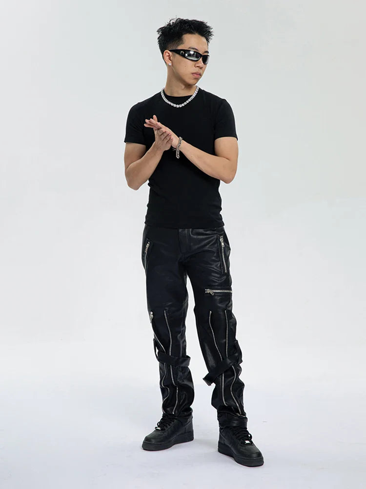 Faux leather trousers with zippers